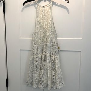 Brand new with tags Free People lace dress.